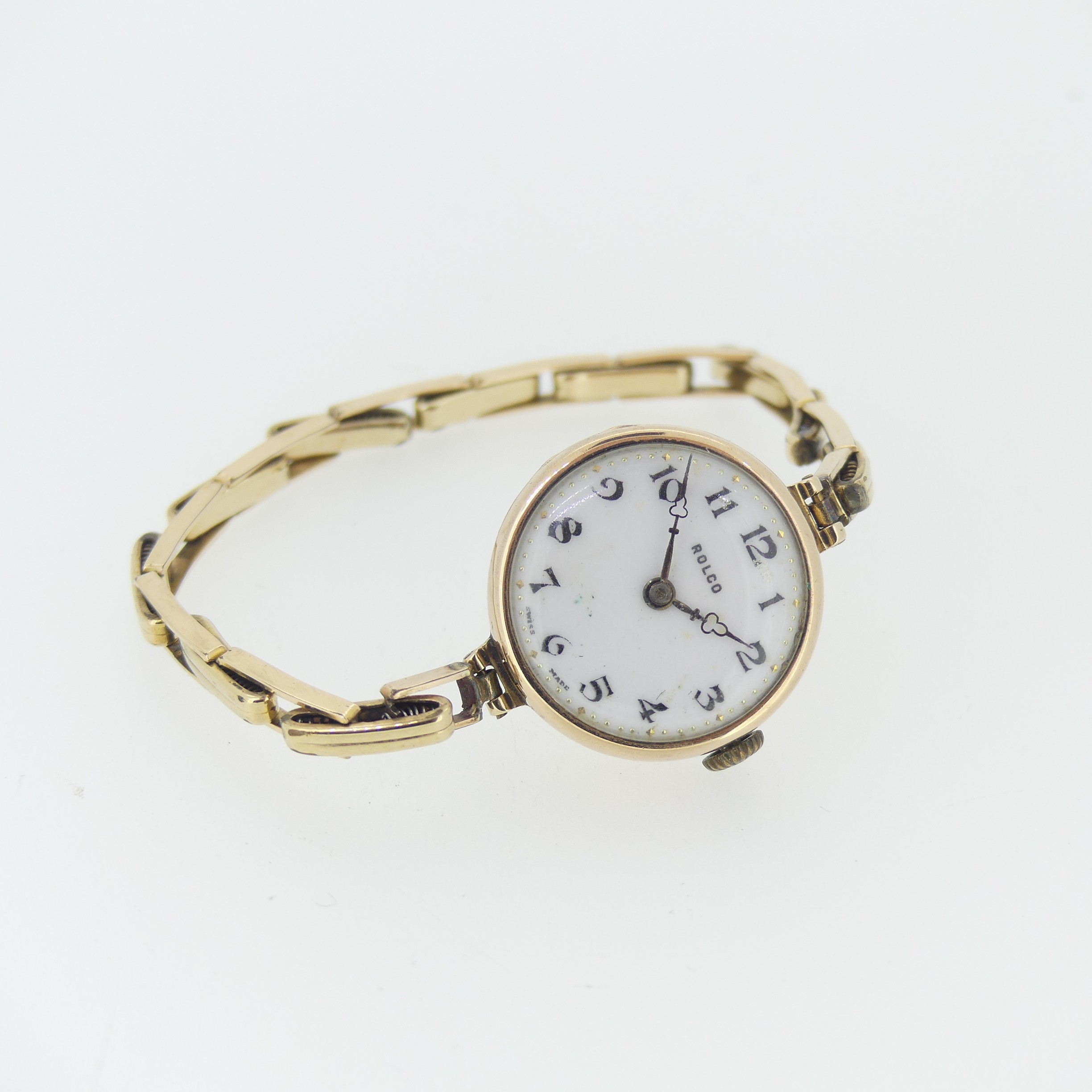 A 9ct yellow gold Rolco lady's Wristwatch, with Swiss 15-jewels movement, white enamel dial with