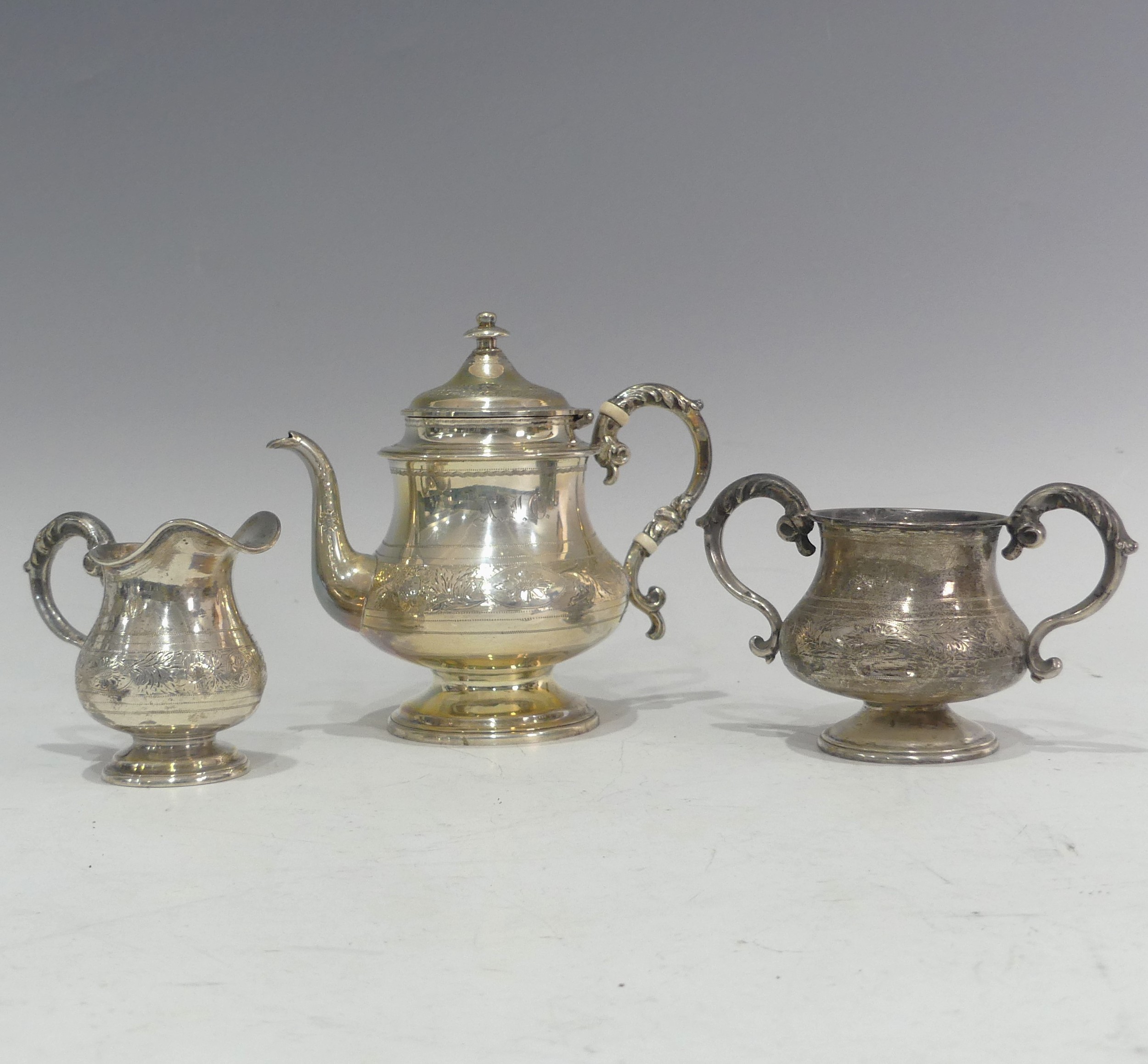 A cased Victorian silver three piece bachelor Tea Set, by Daniel & Charles Houle, hallmarked London, - Image 4 of 17