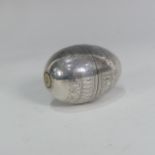 A Russian silver Travelling Egg Cup, in the form of an egg that pulls apart with each half having