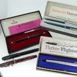 Parker Parkette (Canada) fountain pen in pink marble, and a Parker Televisor (Canada) in black,