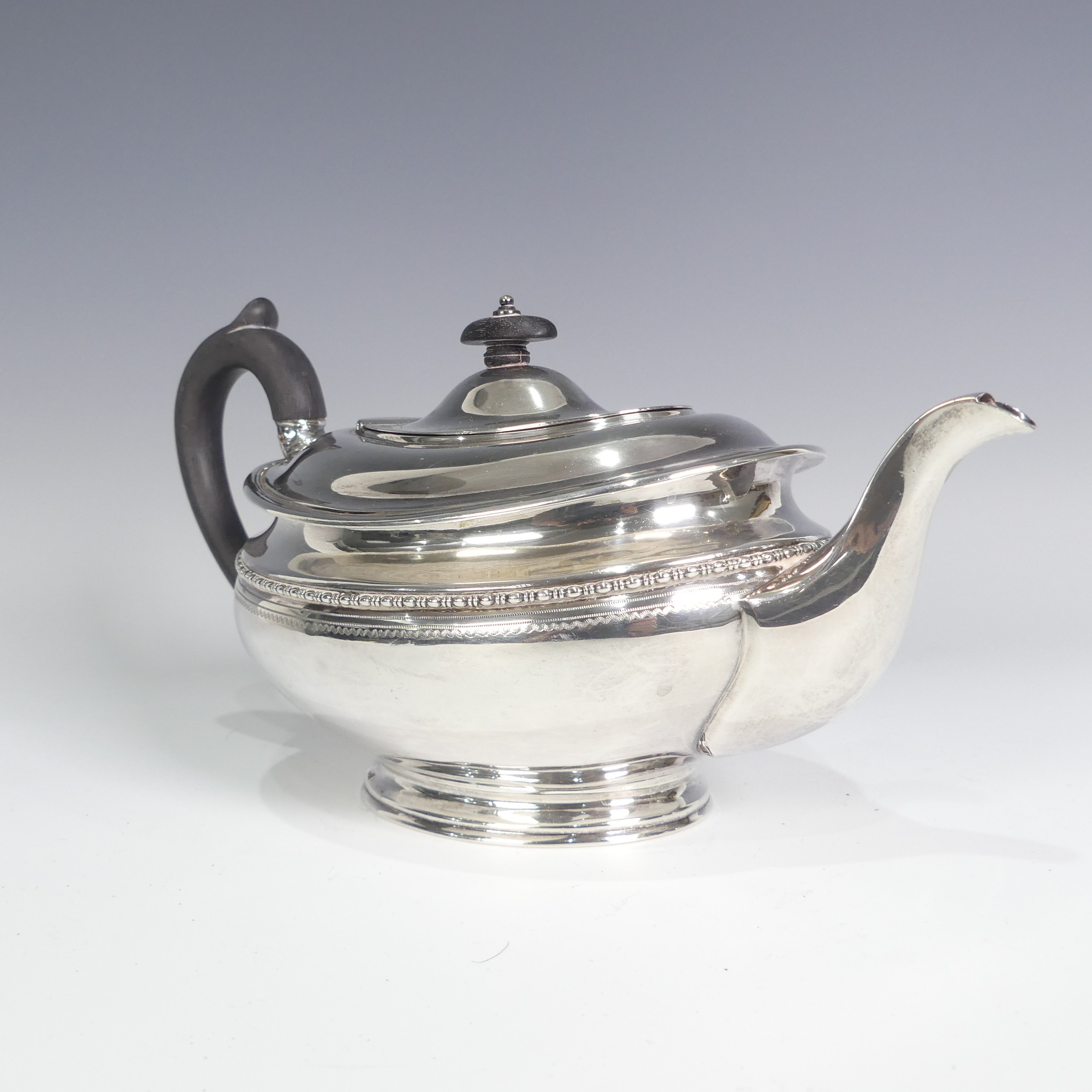 A George V silver three piece Tea Set, by Goldsmiths & Silversmiths Co Ltd., hallmarked Sheffield - Image 10 of 14