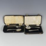 A cased George V silver Spoon and Pusher, the spoon Birmingham 1935, pusher Sheffield, 1922,