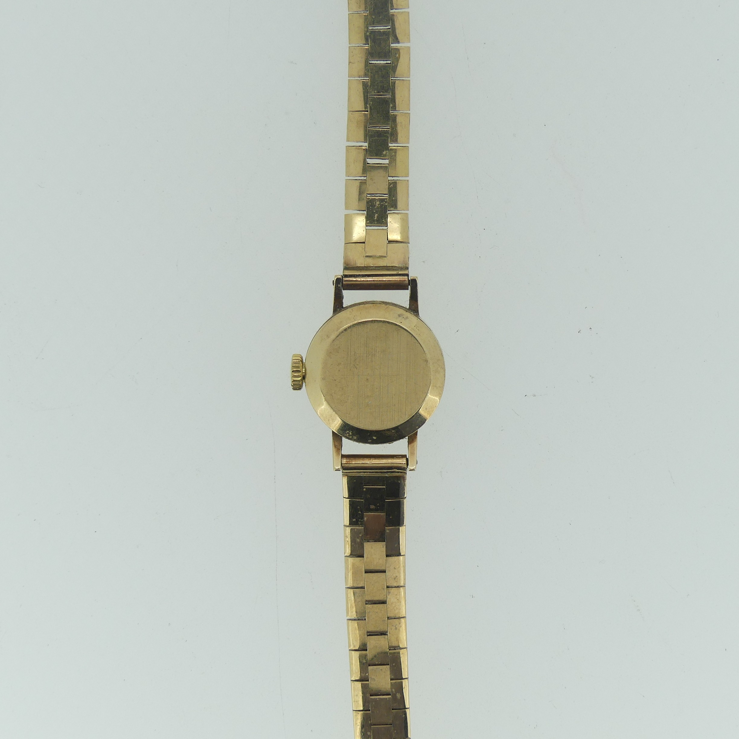 A 9ct yellow gold Omega lady's Wristwatch, with circular silvered dial, gold baton markers and - Image 2 of 3