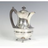 A George V silver Hot Water Pot, by George Nathan & Ridley Hayes, hallmarked Chester 1912, of