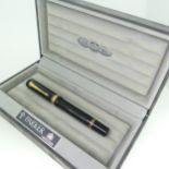 A Parker Duofold Centennial Fountain Pen, with 18ct gold nib, boxed with certificate, chip to cap