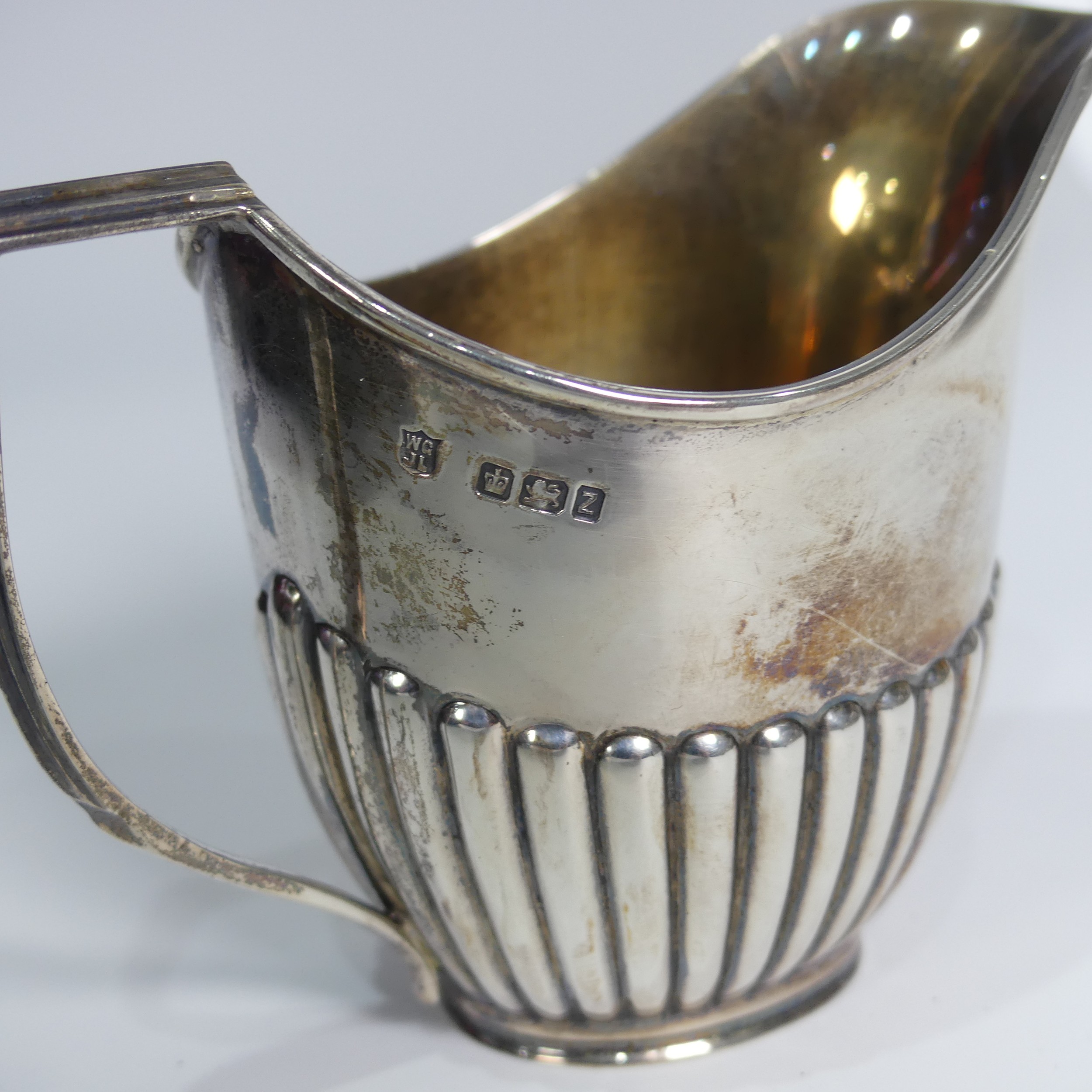 A cased Victorian silver three piece tete-a-tete Tea Set, by Goldsmiths & Silversmiths Co., - Image 5 of 5