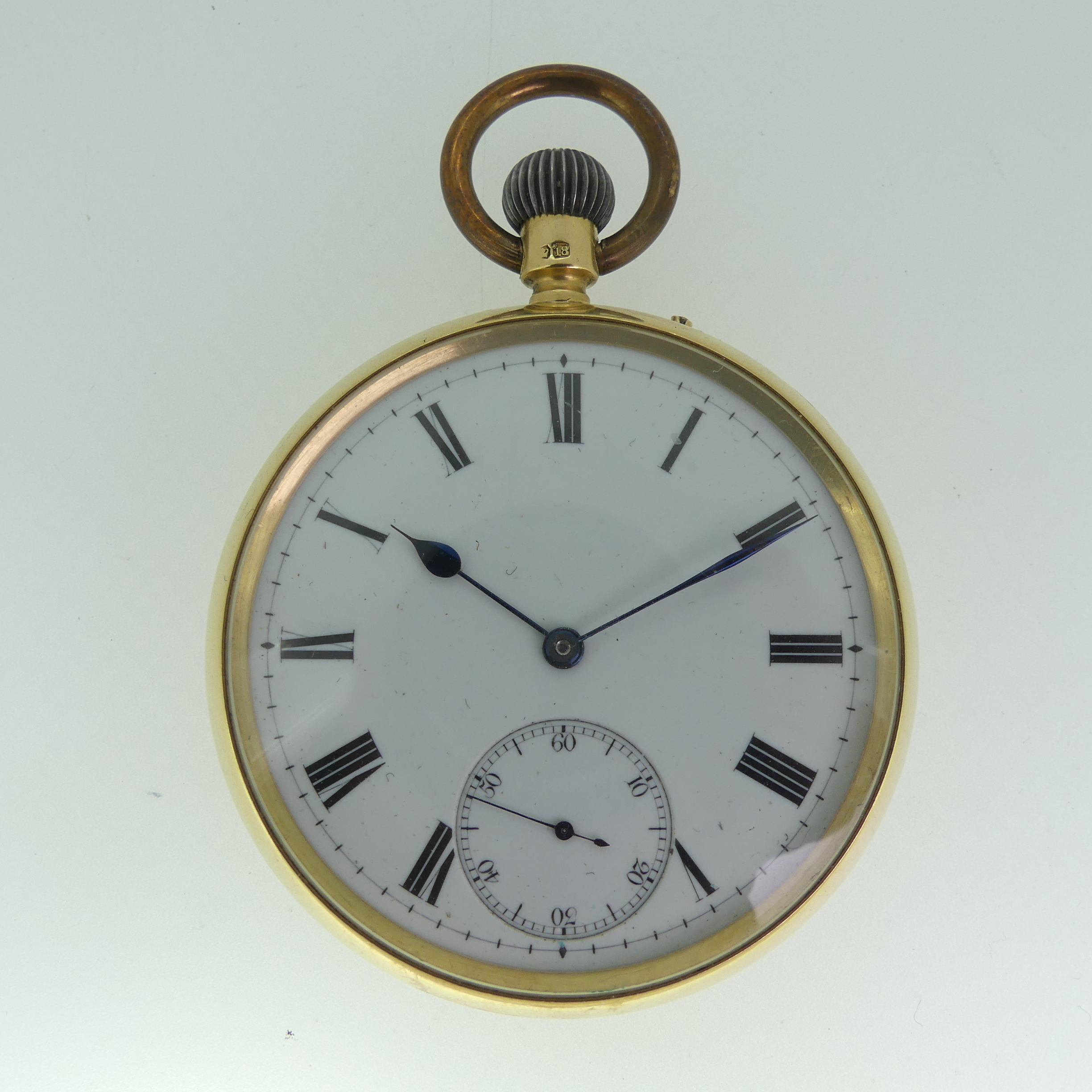 An 18ct gold open face Pocket Watch, unsigned white enamel dial with black Roman Numerals and