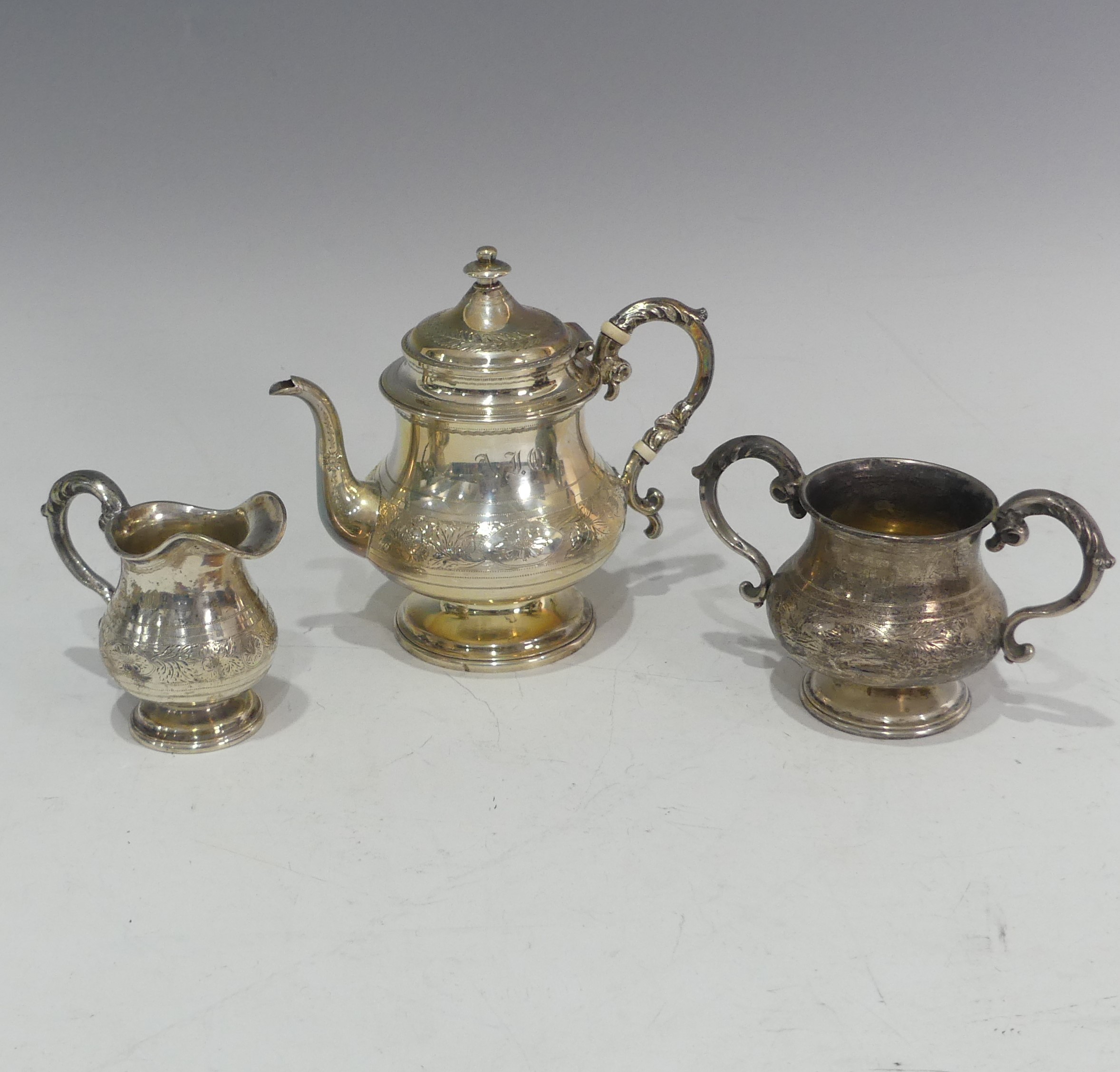A cased Victorian silver three piece bachelor Tea Set, by Daniel & Charles Houle, hallmarked London, - Image 5 of 17