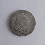 A George I Shilling, dated 1718, good v/f. Provenance; The Jeffery William John Dodman Collection of