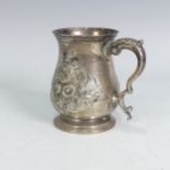A Victorian silver Mug, by Daniel & Charles Houle, hallmarked London, 1861, of baluster form with