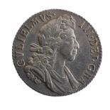 A William III Shilling, dated 1700, good v/f. Provenance; The Jeffery William John Dodman Collection