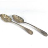 A pair of George III silver Serving Spoons, makers mark 'W.T', hallmarked London, 1774, with later