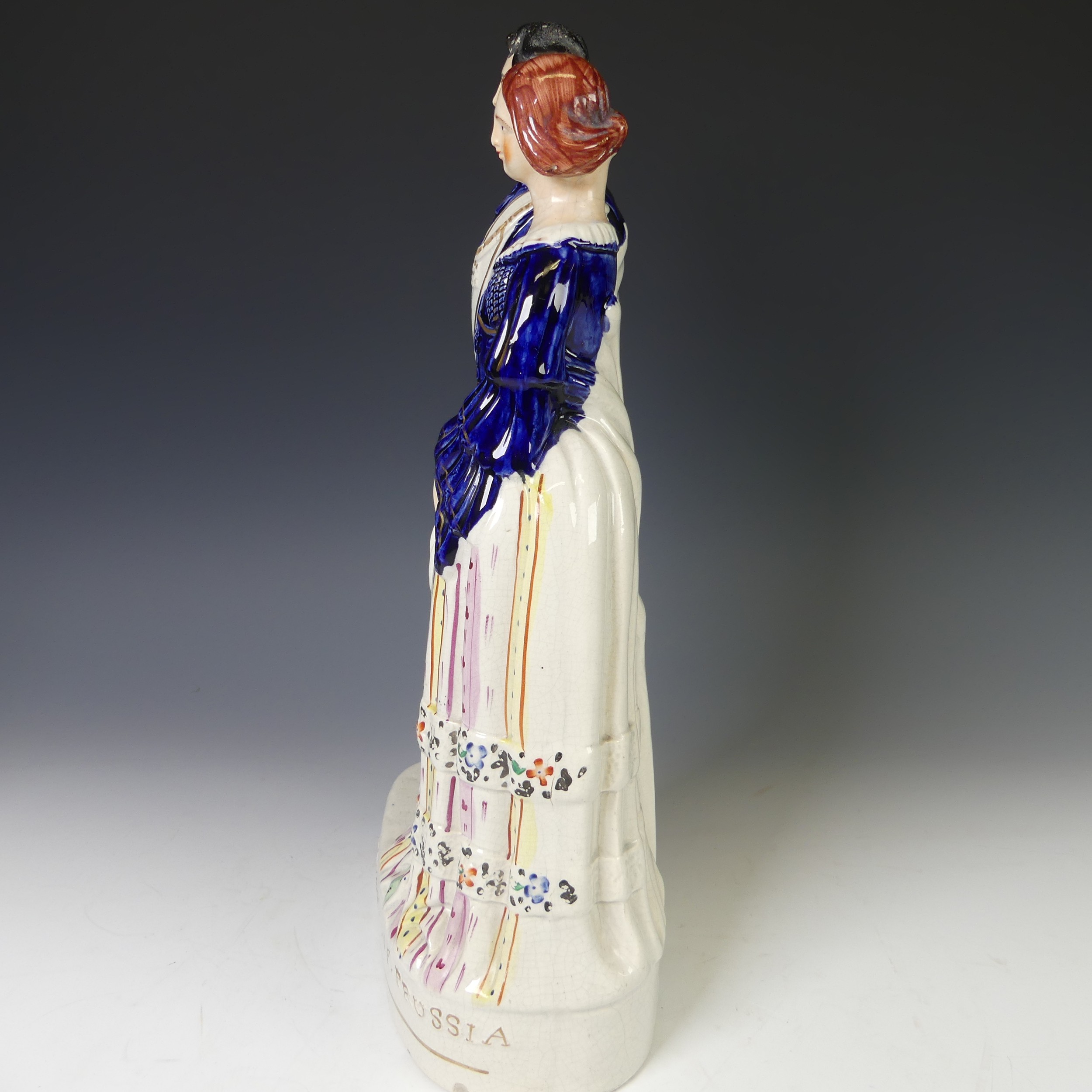 An antique Staffordshire pottery figure of a Jockey on Horseback, the rider with pink hat and blue - Image 6 of 9