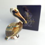 A Royal Crown Derby 'Brown Pelican' Paperweight, with gold stopper to base, boxed.