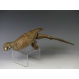 A mid 20thC gilt brass sculpture of a parrot, head to tail 44 cm.