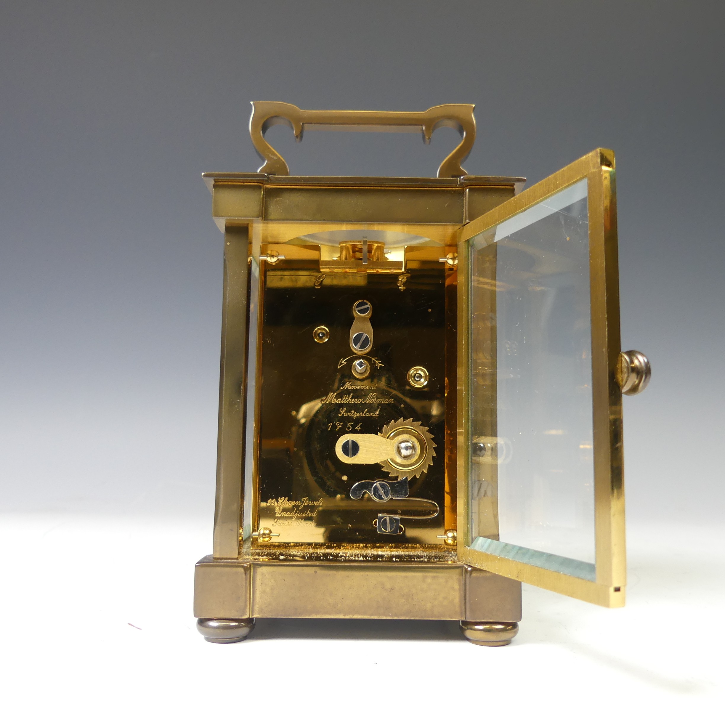 A continental gilt brass Carriage Clock, of typical five-glass form, retailed by Matthew Norman, - Image 5 of 10