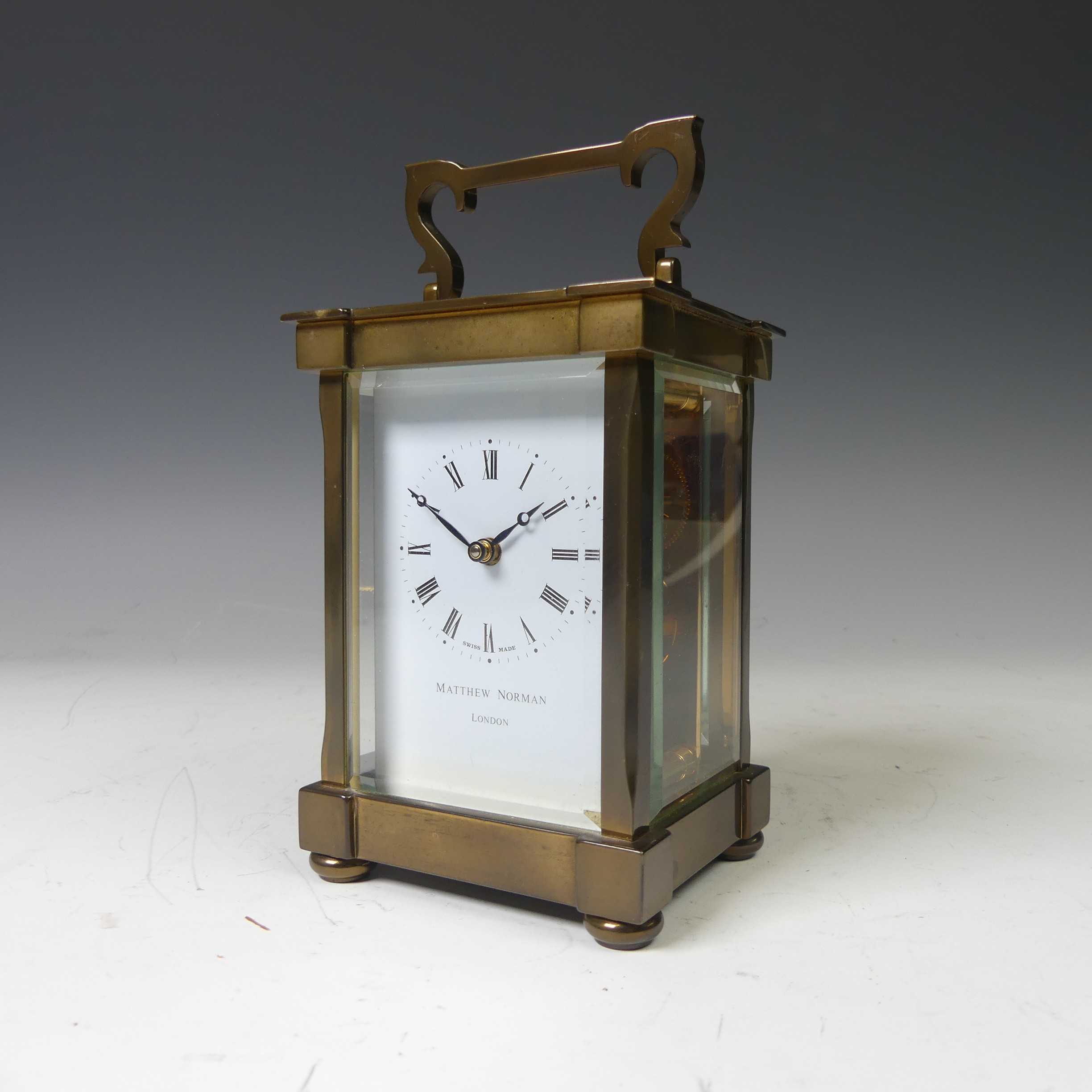 A continental gilt brass Carriage Clock, of typical five-glass form, retailed by Matthew Norman, - Image 2 of 10