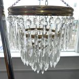 A three tiered gilt brass Chandelier, W 22 cm, together with two glass hanging lustres and a