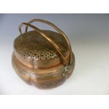 A Chinese copper Hand Warmer, the body of lobed oval form with six panels of decoration depicting