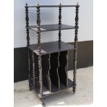 A Victorian ebonised Whatnot, with pierced superstructure and turned finials, with canterbury