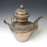 A pair of 19thC Tibetan silver mounted copper ceremonial Teapots, of typical form, the removable