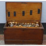 A 19thC mahogany Apothecary Box, the hinged lid opening to reveal an array of approx 60 bottles,