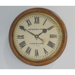 A large early 20th century oak single fusee circular wall clock, the 18-inch 41cm painted dial