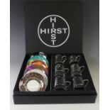 A Damien Hirst six piece anamorphic Coffee Set, comprising six silver Cups with six corresponding
