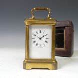 A 19thC French gilt Brass miniature Carriage Clock, of typical five glass form, the unsigned white