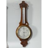 An Edwardian mahogany aneroid Barometer, by W.J.Rowland, Holsworthy, W 25 cm x H 75 cm, together