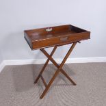 A 19th century mahogany rectangular Butlers Tray raised on a simple folding stand, W 71 cm x H 85 cm
