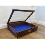 An early 20thC brass bound oak cased table-top Display Case, with hinged glazed lid and vacant