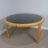 A modern ash circular Table, with an interchangeable centre, to either a natural ash surface or a