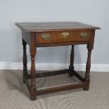 A George III Oak side Table, single frieze drawer raised on turned legs, note handles are