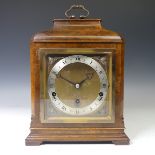 Elliott of London: a walnut cased Elliott mantel clock, Westminster/Whittington chims on eight rods,