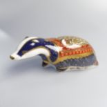 A Royal Crown Derby 'Moonlight Badger' Paperweight, with 21st Anniversary gold stopper to base.
