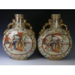 A large pair of 20thC Japanese Satsuma moon Vases, decorated in typical style with gilded dragon