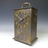 A continental Arts and Crafts brassed metal Mantel Clock, circa early 20th century, of rectangular