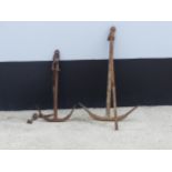 A vintage mental Anchor together with another Anchor of a small size, W 47 cm x L 72 cm(2)