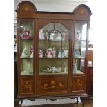 An Edwardian mahogany large Display Cabinet, the shaped top with decorative inlay, above astragal