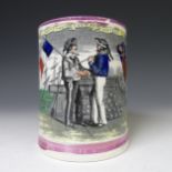 A 19thC Sunderland lustre Frog Mug, celebrating relations between Britain and France with over-