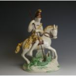 A late 18thC Staffordshire pearlware group of George and the Dragon, possibly Ralph Wood, of burnt