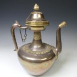 A 19thC Tibetan silver and parcel-gilt ceremonial Teapot / Ewer, the plain tapering circular body