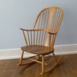 An Ercol Blonde elm and beech chairmaker's rocking Chair, W 62 cm x H 101.5 cm x D 74 cm.