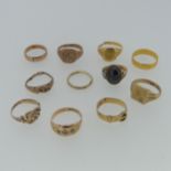 A 22ct yellow gold Band, Size R, 3.8g, together with a damaged 18ct gold buckle ring, 3g, a 9ct gold