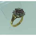 A ruby and diamond cluster Dress Ring, all mounted in unmarked yellow and white gold, tested as 9ct,