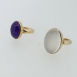 A cabochon amethyst Ring, 15mm long, collet set in 14ct yellow gold, Size N, 4.8g, together with a