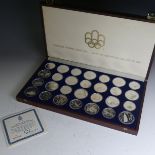 A cased 1976 Canadian Olympics silver proof Coin Set, of twenty-eight coins, fourteen $10 coins