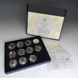 A collection of twenty three Britannia '999 fine silver' one ounce Coins, each in perspex cases,