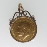 A George V gold Sovereign, dated 1914, in 9ct gold pendant mount, total weight 9.9g.